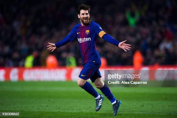 Lionel Messi of FC Barcelona celebrates after scoring his team's third goal during the La Liga match between Barcelona and Girona at Camp Nou on...