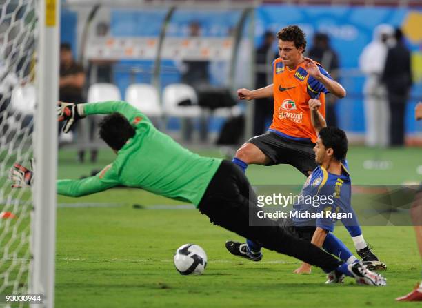 Elano scores a goal during the Brazil training session at the Khalifa Stadium on November 13, 2009 in Doha, Qatar.