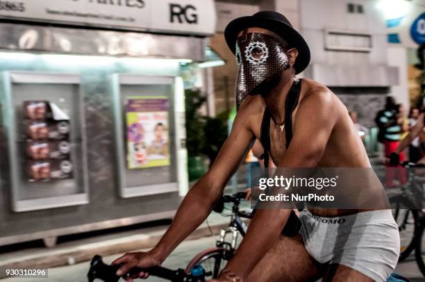 Explicit Content] People take part in Sao Paulo, Brazil, on 10 March 2018 at the 11th edition of the World Naked Bike Ride, the bicicletada pelada,...