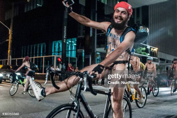 Explicit Content] People take part in Sao Paulo, Brazil, on 10 March 2018 at the 11th edition of the World Naked Bike Ride, the bicicletada pelada,...