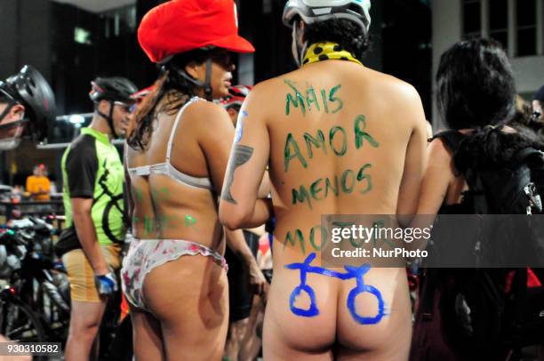 Explicit Content] People take part in Sao Paulo, Brazil, on 10 March 2018 at the 11th edition of the World Naked Bike Ride, the bicicletada pelada,...