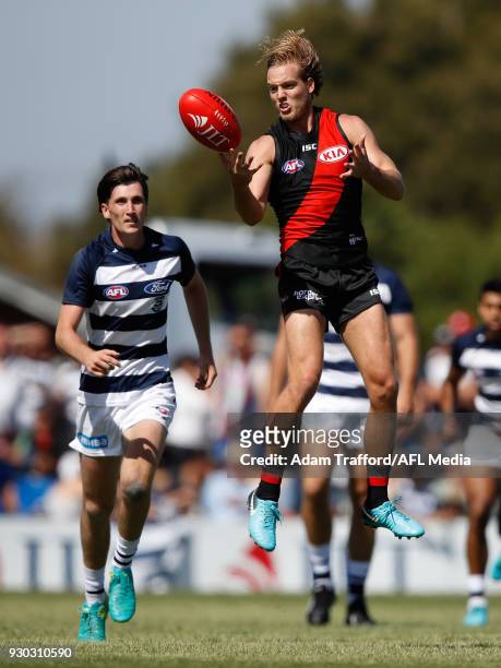 Darcy Parish of the Bombers attempts to mark during the AFL 2018 JLT Community Series match between the Geelong Cats and the Essendon Bombers at...