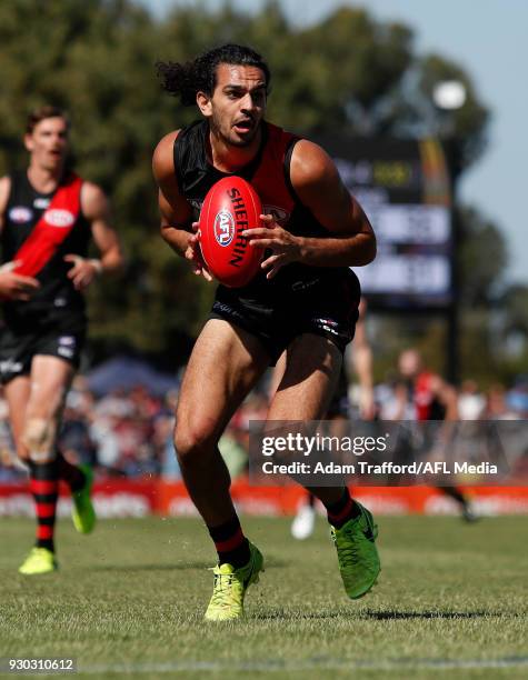 Jake Long of the Bombers in action during the AFL 2018 JLT Community Series match between the Geelong Cats and the Essendon Bombers at Central...