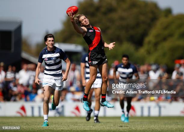 Darcy Parish of the Bombers attempts to mark during the AFL 2018 JLT Community Series match between the Geelong Cats and the Essendon Bombers at...