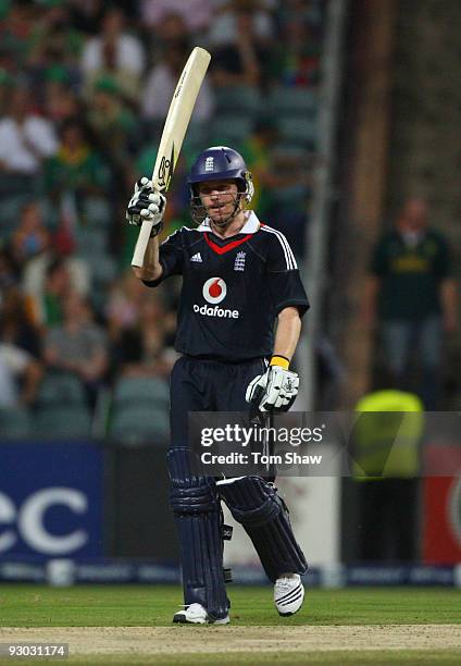 Eoin Morgan of England celebrates his half century during the Twenty20 International match between South Africa and England at the Wanderers on...