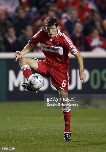 Brandon Prideaux the Chicago Fire handles the ball against the New England Revolution during the first half of game 2 of the Eastern Conference...