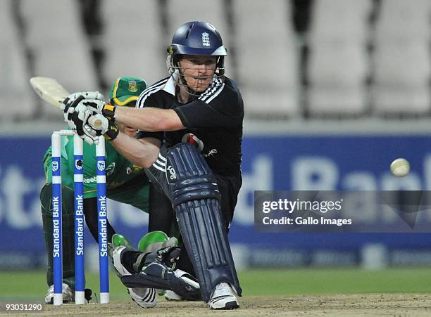 Eoin Morgan of England with a reverse sweep during the 1st Standard Bank International Pro20 match between South Africa and England at the Liberty...