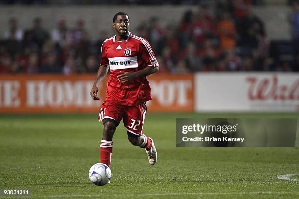 Dasan Robinson of the Chicago Fire moves the ball up the field against the New England Revolution during the second half of game 2 of the Eastern...