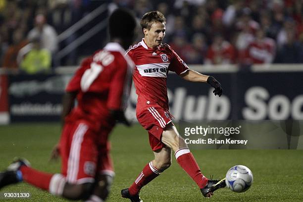 Chris Rolfe of the Chicago Fire moves the ball against the New England Revolution during the second half of game 2 of the Eastern Conference...
