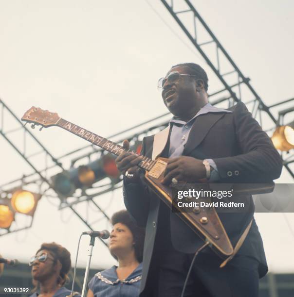 American singer and blues guitarist Albert King performs live on stage playing his Gibson Flying V guitar at the Newport Jazz Festival, held in New...