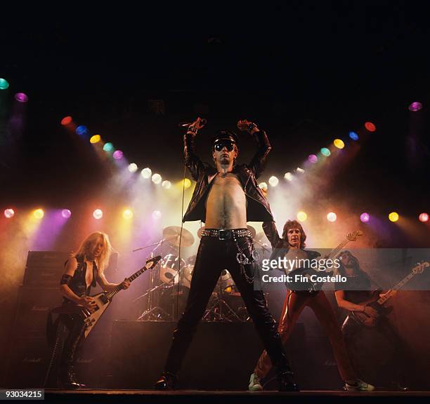 Downing, Rob Halford, Glenn Tipton and Ian Hill of Judas Priest perform on stage - Unleashed In The East album cover session taken in July 1979.