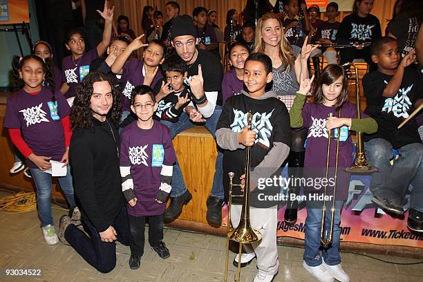 Singers Constantine Maroulis, James Carpinello, Kerry Butler of "Rock of Ages" and school children attend PS/IS 111 on November 13, 2009 in New York...