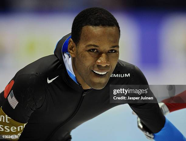 Shani Davis of the USA smiles after clocking the fastest time racing against Havard Bokko of Norway in the 1500m race during the Essent ISU speed...