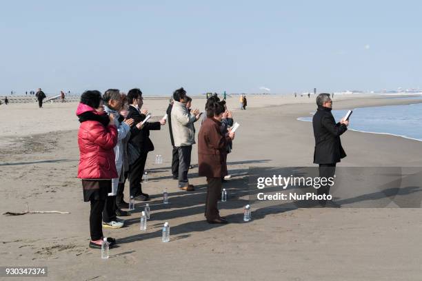 People pray for the victims of massive earthquake and tsunami disaster at Arahama area, Miyagi prefecture at 11 March 2018. Seven years have passed...