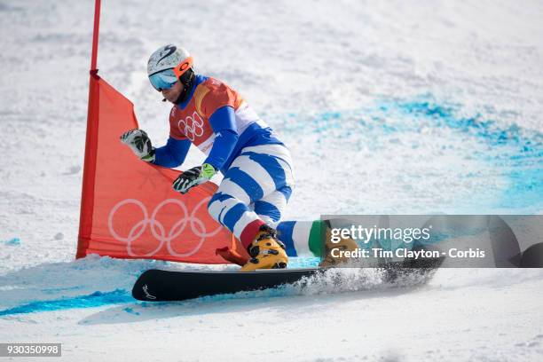 Roland Fischnaller of Italy in action during the Men's Snowboard Parallel Giant Slalom competition at Phoenix Snow Park on February 24, 2018 in...