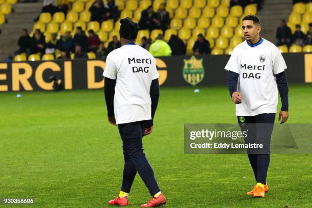 Yassine El Ghanassy of Nantes wears the tee shirt in memory of the kinesitherapeuthe of the team of Nantes, Philippe Daguillon, who died yesterday...