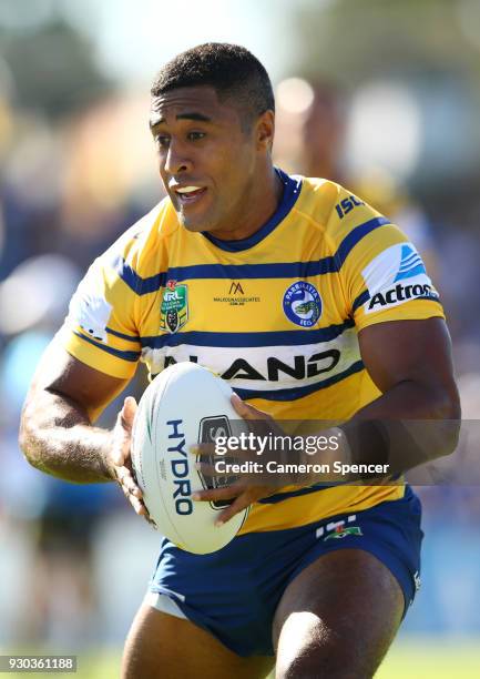 Michael Jennings of the Eels runs the ball during the round one NRL match between the Penrith Panthers and the Parramatta Eels at Panthers Stadium on...