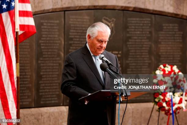 Secretary of State Rex Tillerson speaks to survivors at the 1998 U.S. Embassy bombing memorial site in Nairobi on March 11, 2018. / AFP PHOTO / POOL...