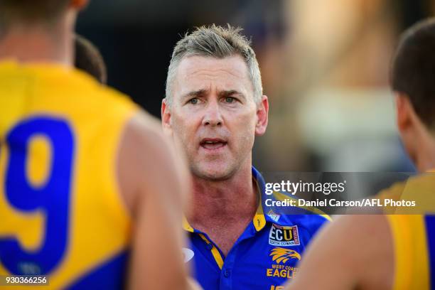 Adam Simpson, coach of the Eagles addresses the team at three quarter time during the AFL 2018 JLT Community Series match between the Fremantle...