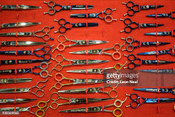 Specialist dog hair trimming scissors are displayed on a stand on day four of the Cruft's dog show at the NEC Arena on March 11, 2018 in Birmingham,...