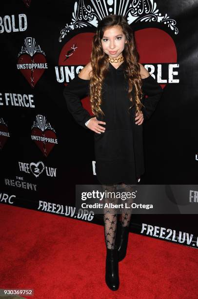 Actress Lulu Lambros arrives for the Free2Luv Presents "Unstoppable" held at the Regent Theater on March 10, 2018 in Los Angeles, California.