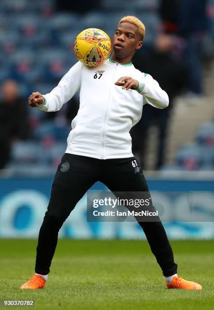 Charly Musonda of Celtic warms up prior to the Ladbrokes Scottish Premiership match between Rangers and Celtic at Ibrox Stadium on March 11, 2018 in...