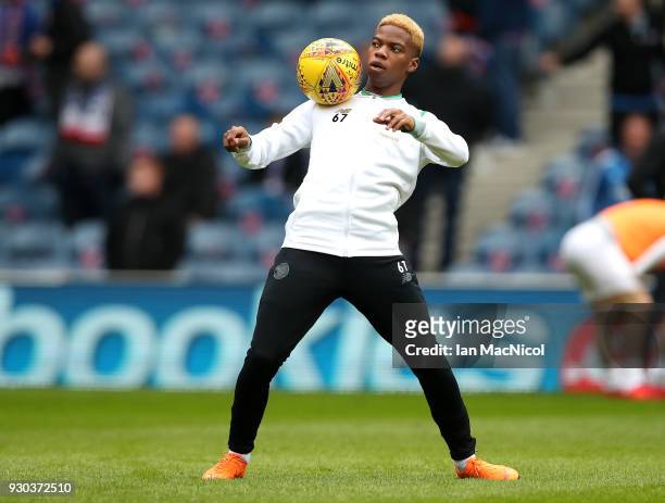 Charly Musonda of Celtic warms up prior to the Ladbrokes Scottish Premiership match between Rangers and Celtic at Ibrox Stadium on March 11, 2018 in...