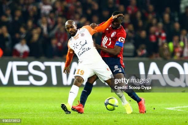 Ibrahim Amadou of Lille and Souleymane Camara of Montpellier during the Ligue 1 match between Lille OSC and Montpellier Herault SC at Stade Pierre...