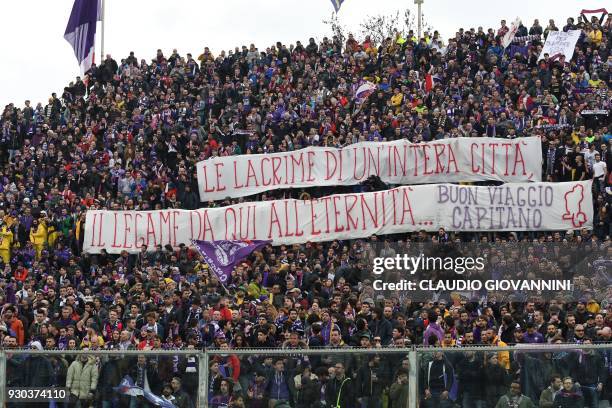 Fiorentina's supporters pay tribute to late Fiorentina captain Davide Astori with giant banners on March 11, 2018 before the Italian Serie A football...