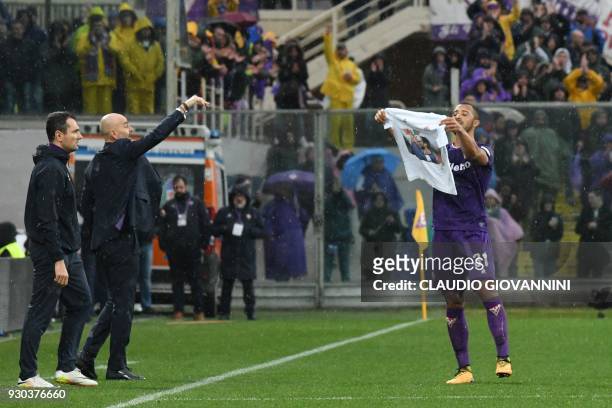Fiorentina's defender Vitor Hugo pays tribute to late Fiorentina's captain Davide Astori after scoring on March 11, 2018 during the Italian Serie A...