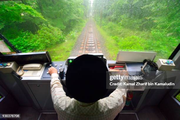 hakone train operator - kamal zharif stock pictures, royalty-free photos & images