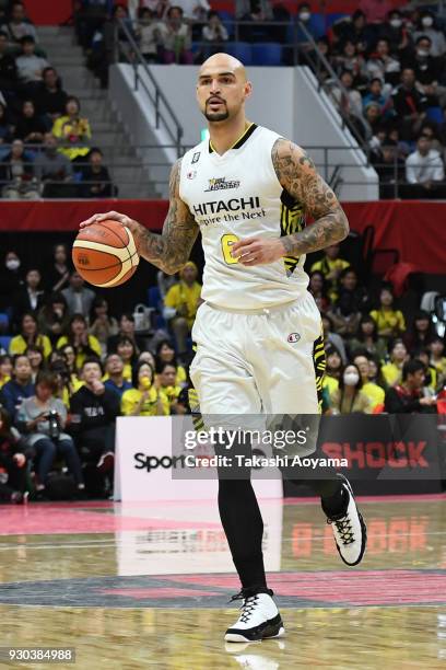 Robert Sacre of the Sun Rockers Shibuya dribbles the ball during the B.League game between Alvark Tokyo and Sun Rockers Shibuya at Arena Tachikawa...