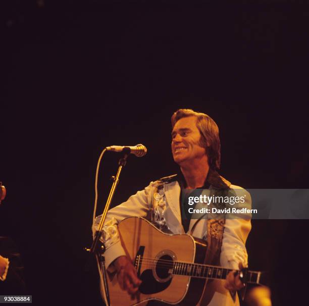 George Jones performs on stage at the Country Music Festival held at Wembley Arena, London in April 1981.