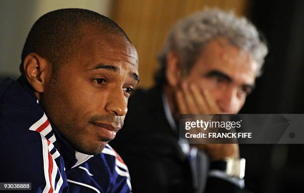 France football team coach Raymond Domenech and captain, Thierry Henry answer questions at a press conference, on November 13, 2009 at the hotel, on...