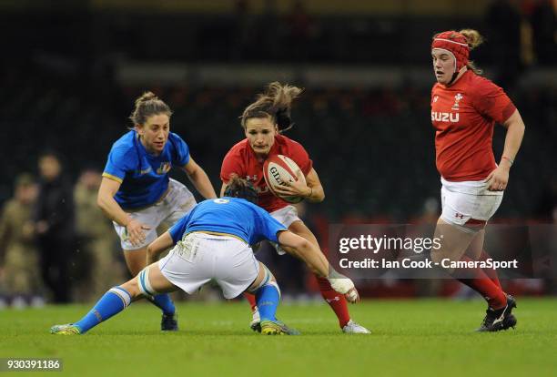 Wales Jaz Joyce takes on Italys Elisa Giordano during the Women's Six Nations Championship match between Wales Women and Italy Women at Principality...