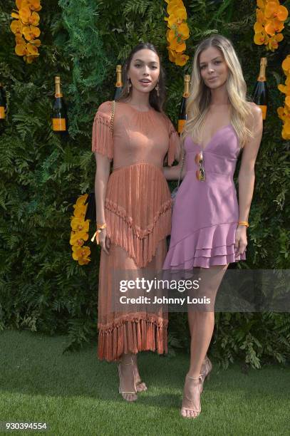 Melody de la Fe and Danielle Knudson are seen at the Veuve Clicquot Fourth Annual Clicquot Carnaval Supporting the Perez Art Museum Miami at Museum...