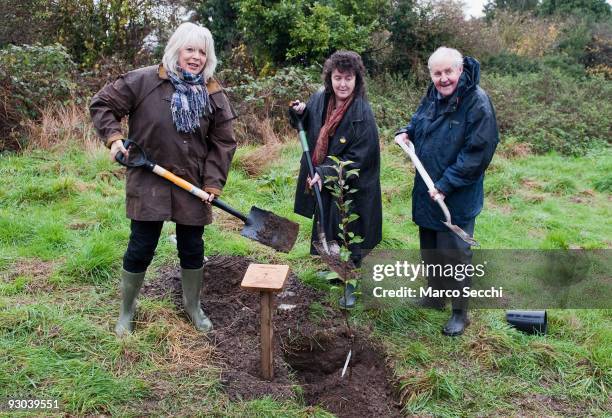 Actress Alison Steadman British poet Carol Ann Duffy and Actor Richard Briers plant an apple tree in the village of Sipson on November 13, 2009 in...