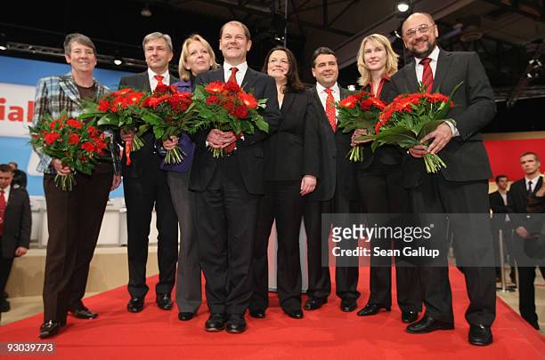 Newly elected leading members of the German Social Democratic Party , including Treasurer Barbara Hendricks, co-Deputy Chairman Klaus Wowereit,...