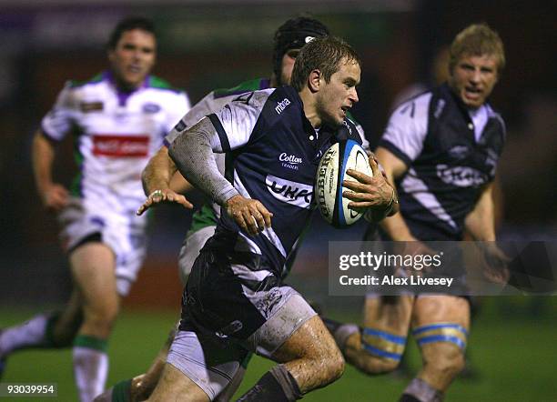 Matthew Tait of Sale Sharks runs at the Leeds Carnegie defence during the LV Anglo Welsh Cup at Edgeley Park on November 13, 2009 in Stockport,...