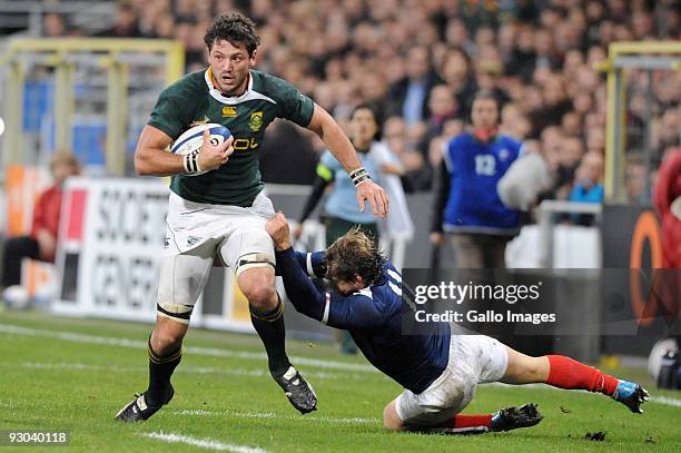 Ryan Kankowski of South Africa tackled by Cedric Heymans of France during the International match between France and South Africa at Toulouse Stadium...