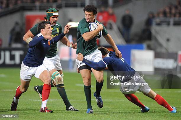 Zane Kirchner of South Africa tackled by Vincent Clerc of France during the International match between France and South Africa at Toulouse Stadium...