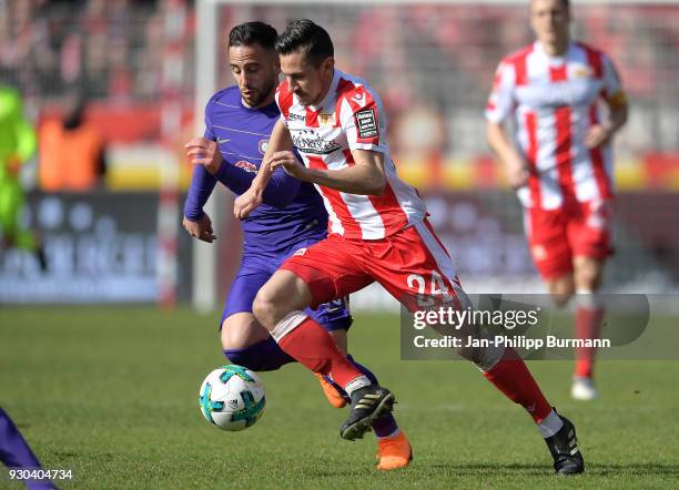 Calogero Rizzuto of Erzgebirge Aue and Steven Skrzybski of 1 FC Union Berlin during the 2nd Bundesliga game between Union Berlin and FC Erzgebirge...