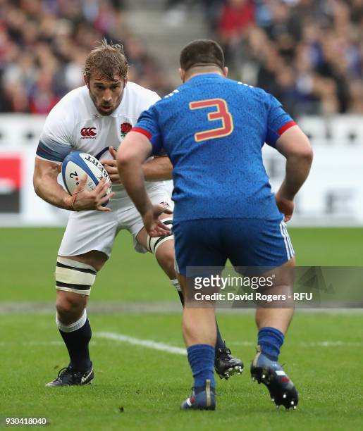 Chris Robshaw of England takes on Rabah Slimani during the NatWest Six Nations match between France and England at Stade de France on March 10, 2018...