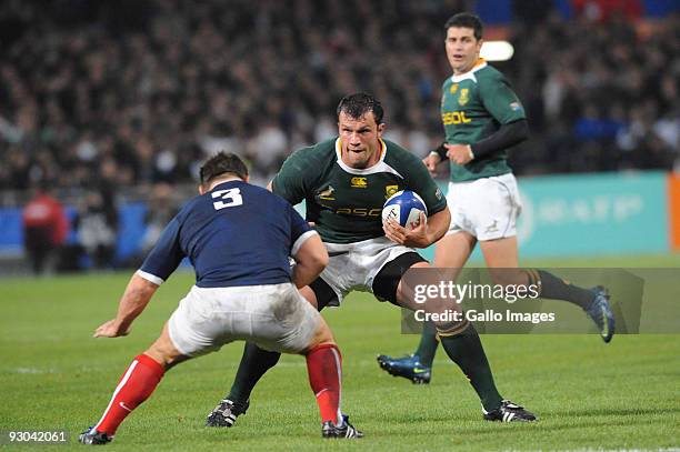 Nicolas Mas of France about to tackle Bismark du Plessis of South Africa during the International match between France and South Africa at Toulouse...