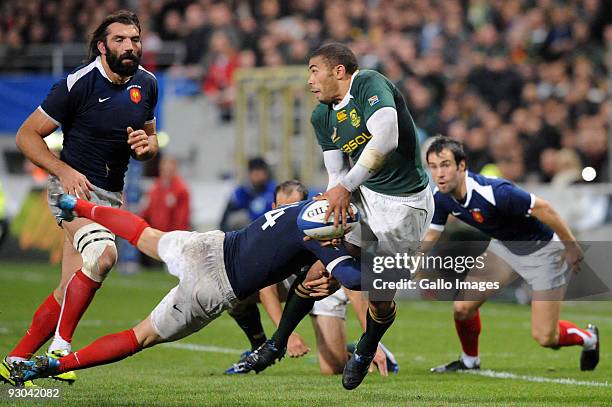 Vincent Clerc of France tackles Bryan Habana of South Africa during the International match between France and South Africa at Toulouse Stadium on...