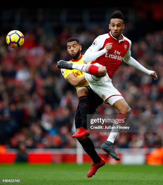 Pierre-Emerick Aubameyang of Arsenal and Adrian Mariappa of Watford in action during the Premier League match between Arsenal and Watford at Emirates...