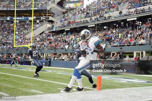 Wide receiver Calvin Johnson of the Detroit Lions makes a catch at the one-yard line against Marcus Trufant of the Seattle Seahawks on November 8,...