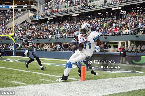 Wide receiver Calvin Johnson of the Detroit Lions makes a catch at the one-yard line against Marcus Trufant of the Seattle Seahawks on November 8,...
