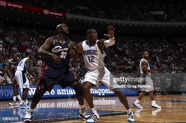 Cleveland Cavaliers Shaquille O'Neal in action vs Orlando Magic Dwight Howard . Orlando, FL CREDIT: Greg Nelson