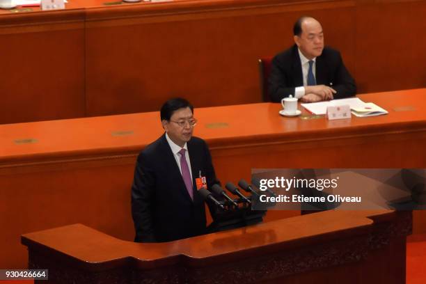 Chairman of the Standing Committee of the National People's Congress Zhang Dejiang delivers a speech following a vote to repeal presidential term...